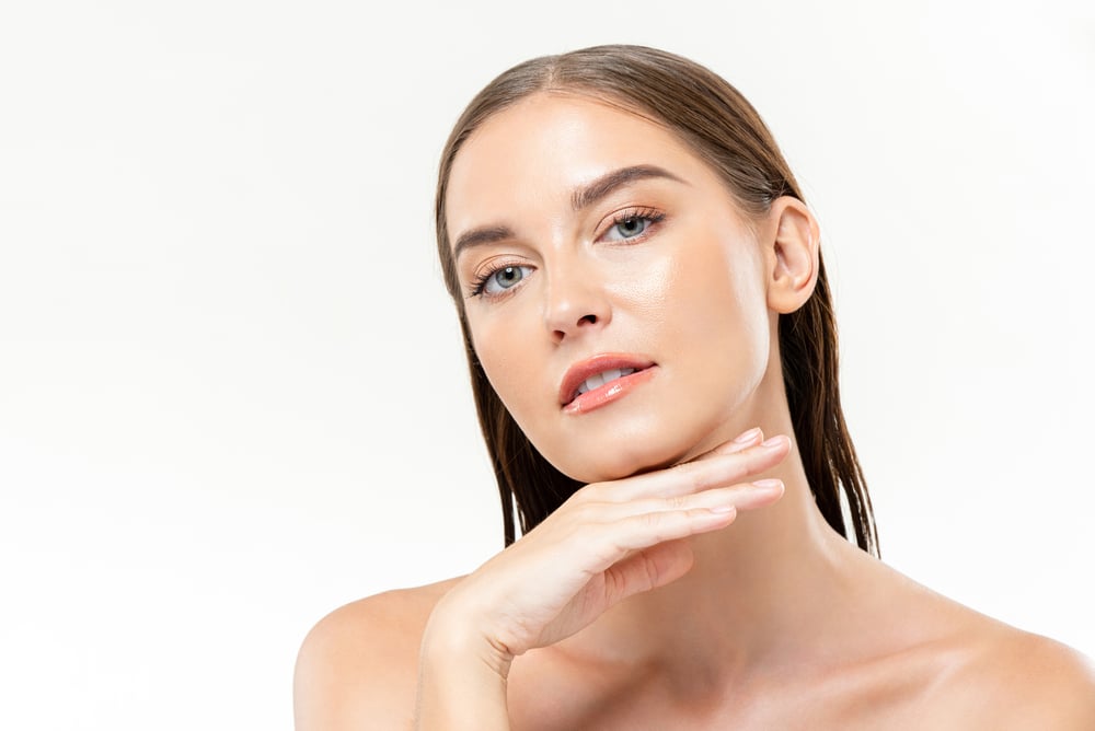 Beautiful,Caucasian,Woman,With,Clean,Glowing,Face,Skin,In,Isolated
