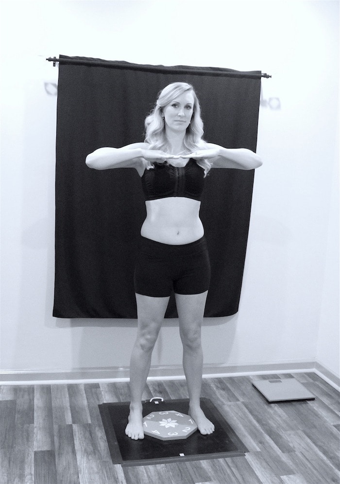 Atlanta CoolSculpting patient on a scale